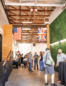 People in the service drive at Kings Cross Automotive celebrating the British Block Party